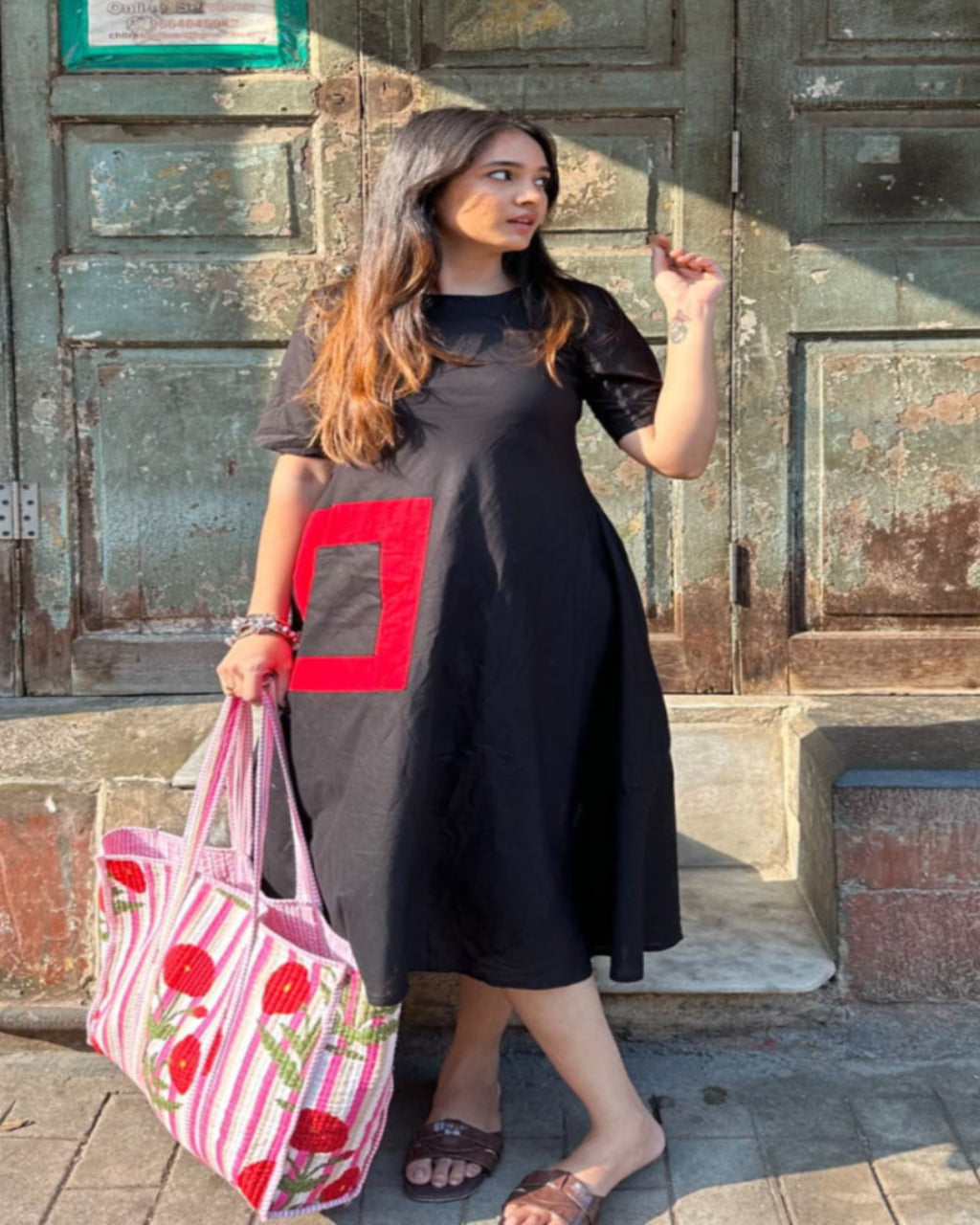 The Red Pocket Black Dress